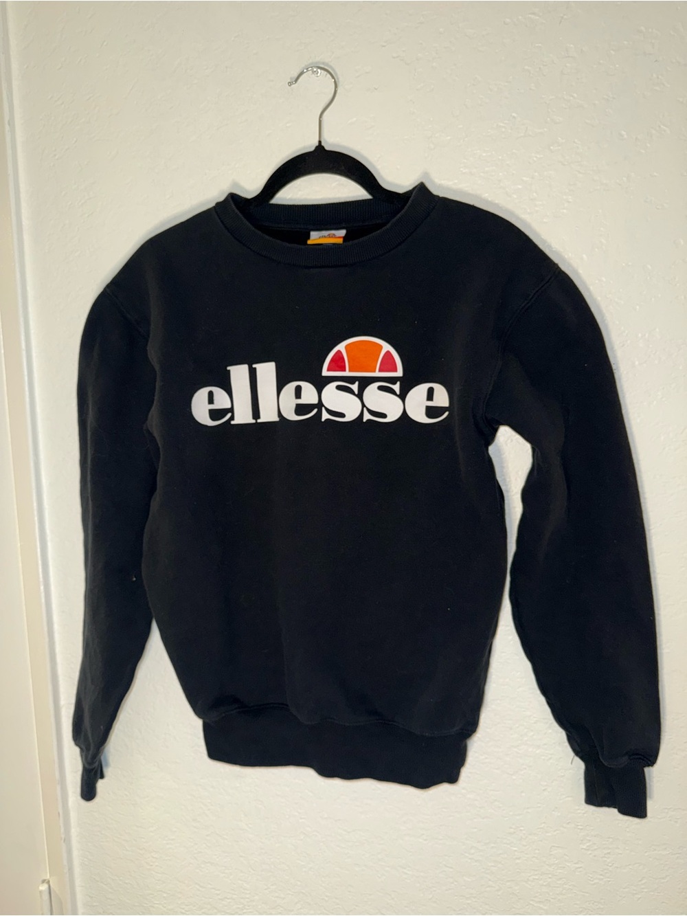 Ellesse Black Crewneck Sweatshirt with Orange Accent Logo